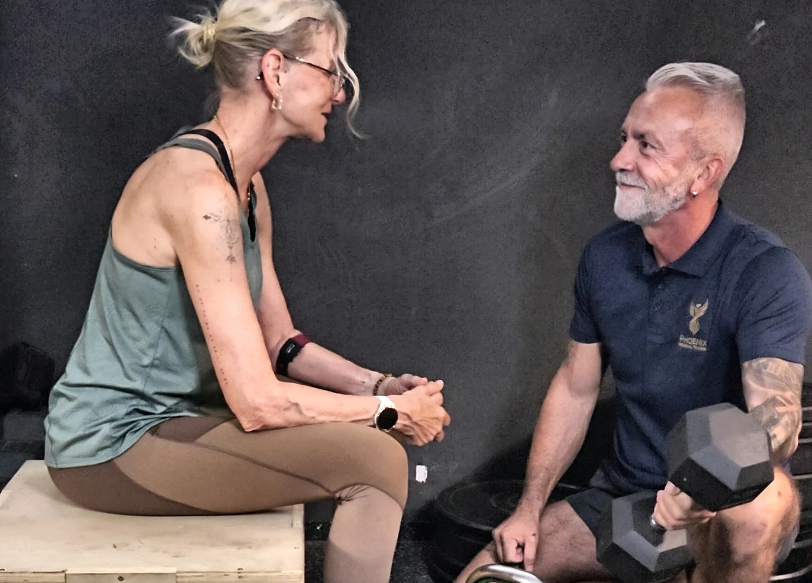 Matthias in a personal conversation with a client at the gym